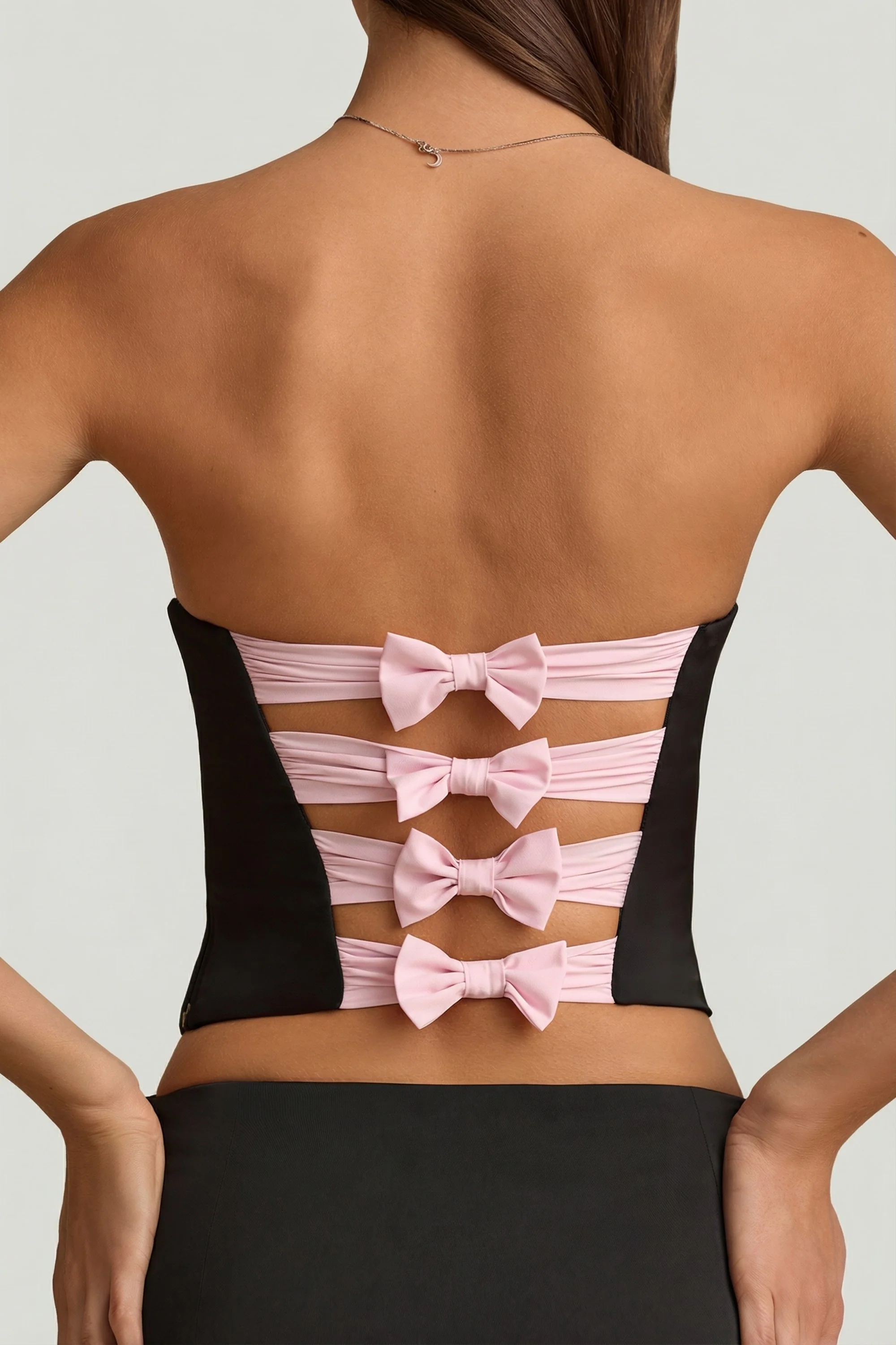 Cut-Out Bow-Detail Corset Top in Black - Image 5