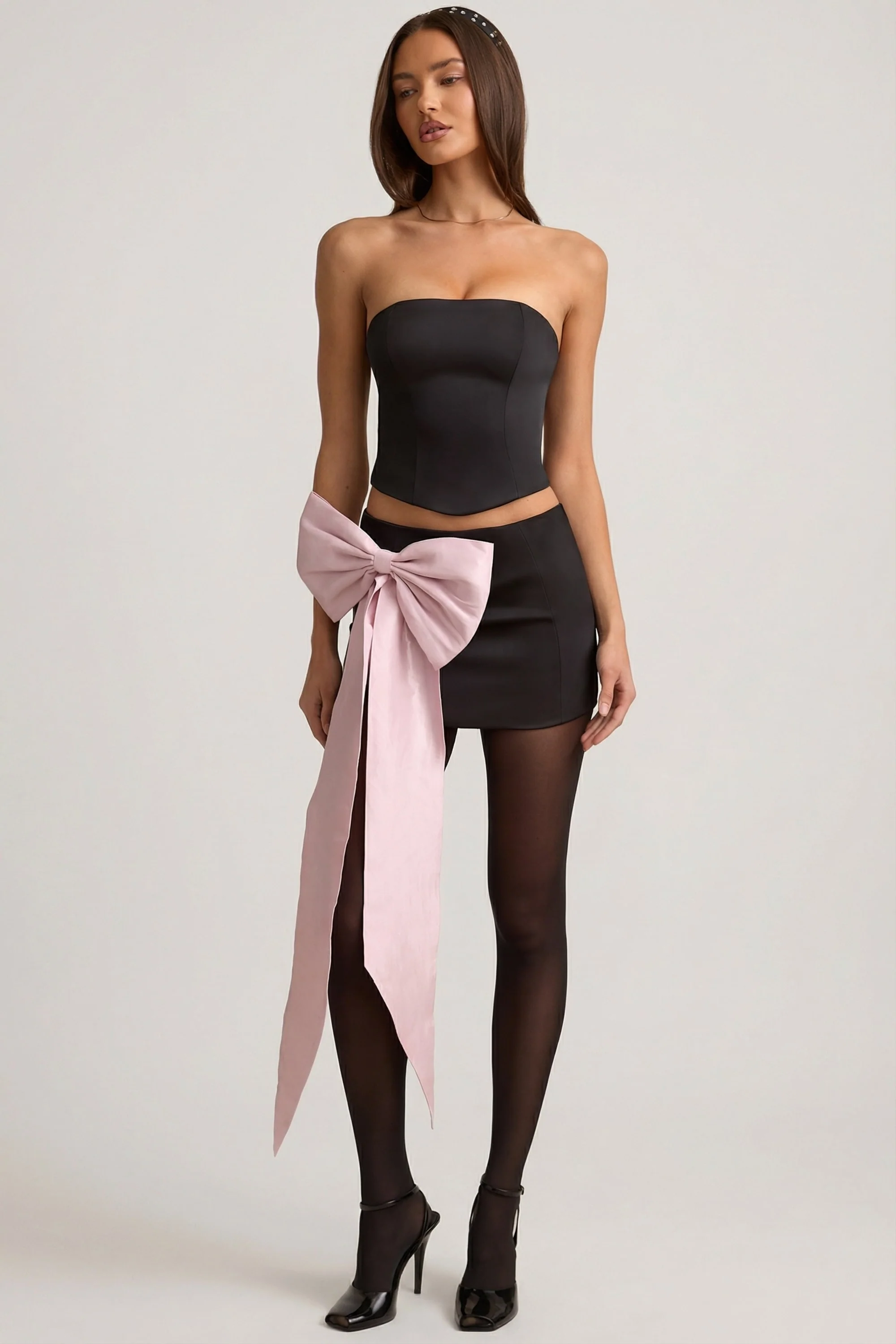 Satin Bow-Detail Low-Rise Mini Skirt in Black - Image 6