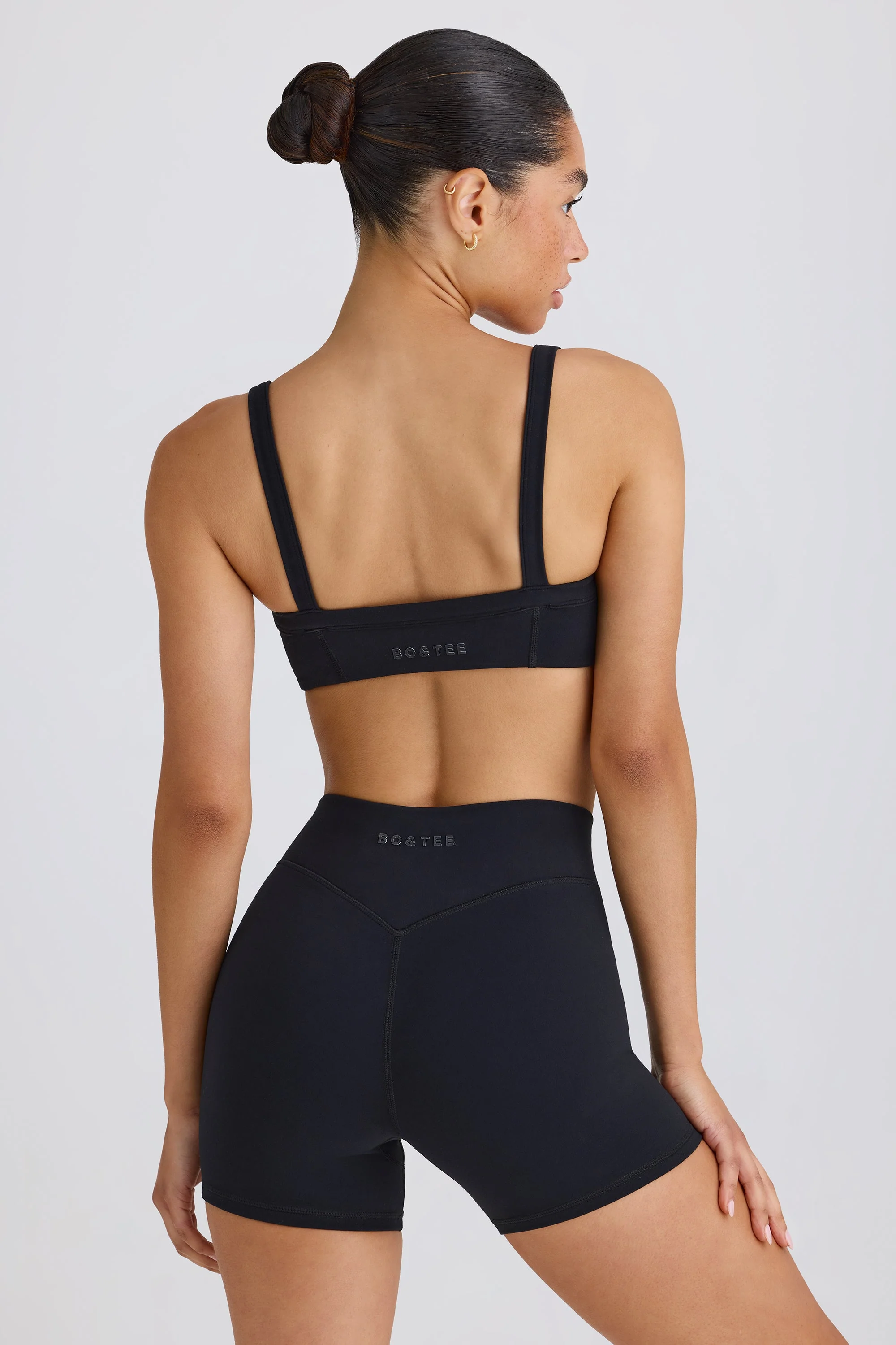 Soft Active Crossover Mini Shorts in Black - Image 2